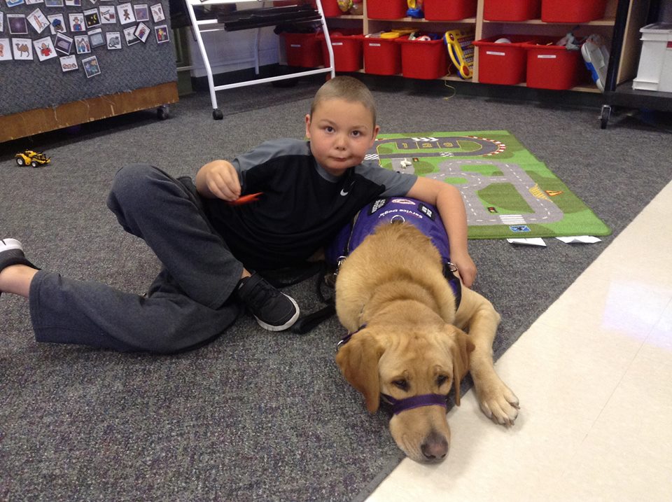 Hunter and Nestle his National Service Dog.