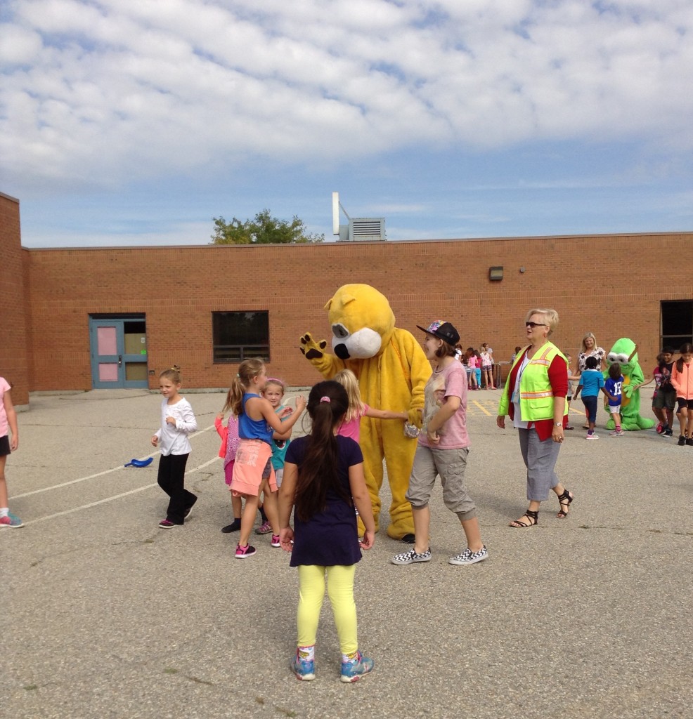 One of the schools' mascots greeting the students.