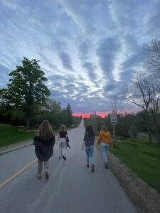 Emily walking with friends