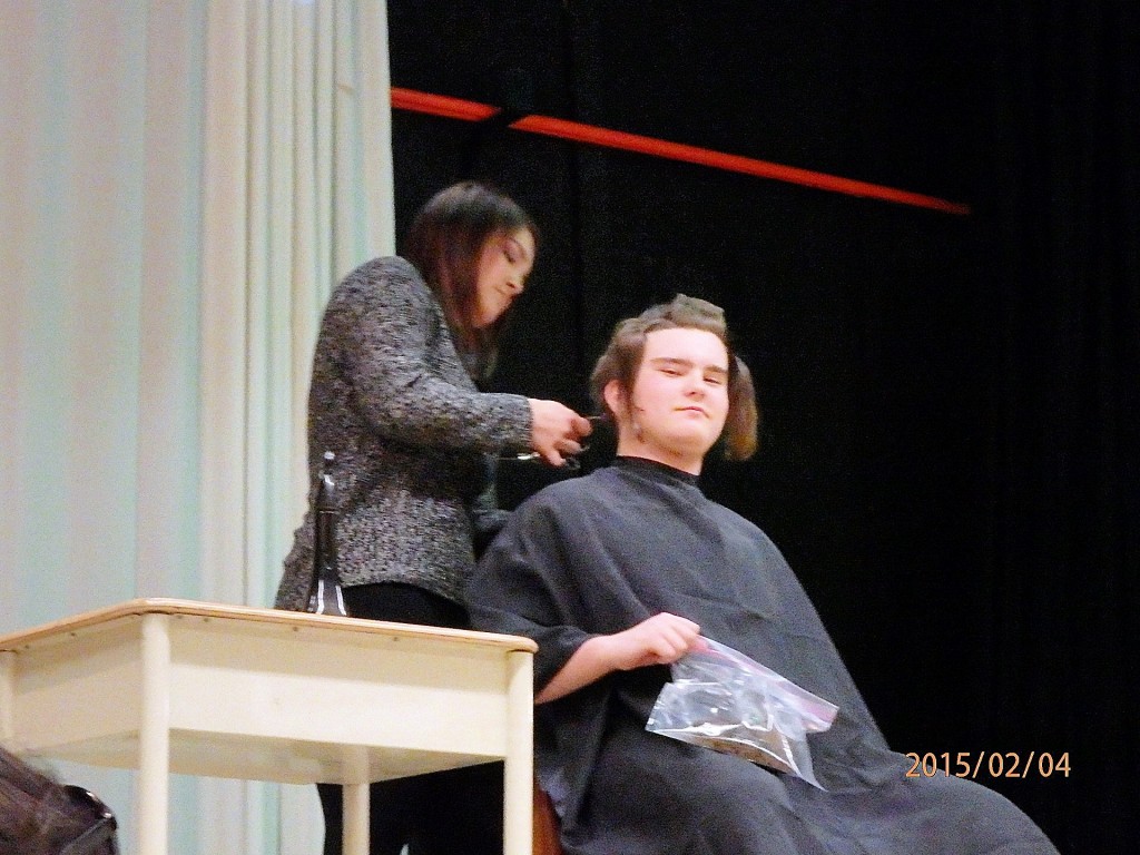 Chop, chop chop! There goes the hair for Locks of Love.