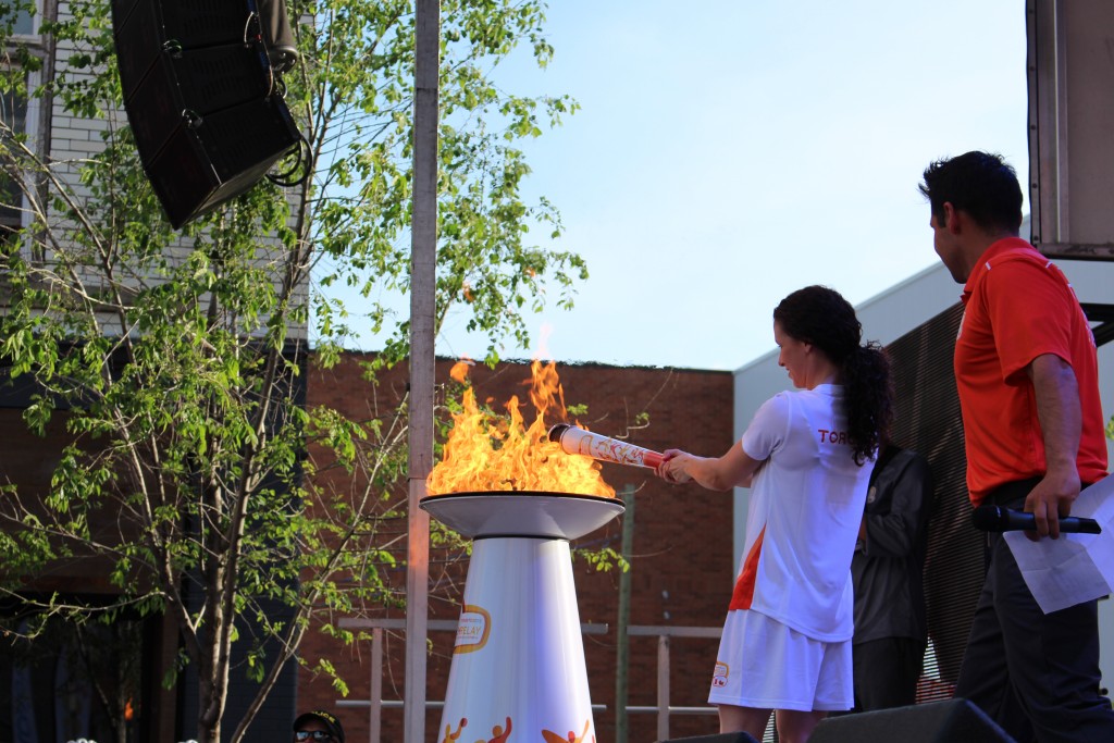 Mandy Bujold lights Kitchener's Pan Am cauldron. 