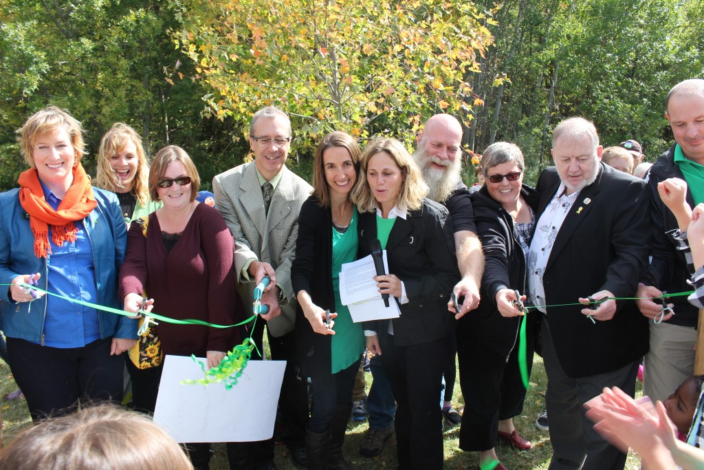 Time to cut the ribbon and dedicate the new outdoor space!