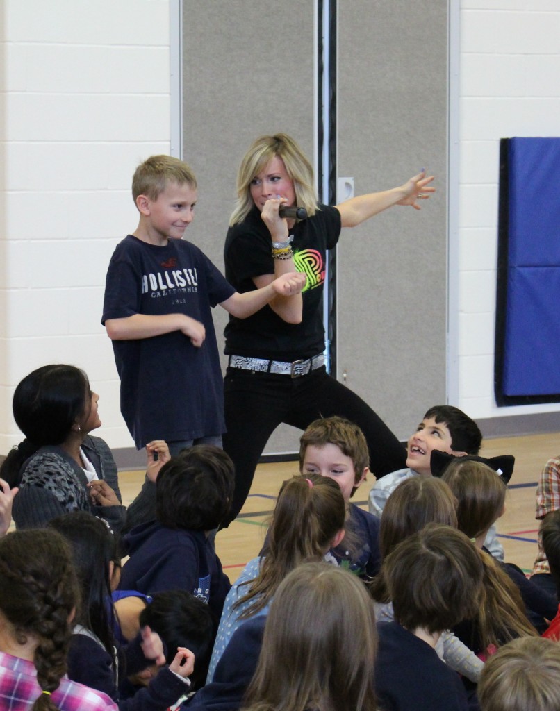 Rockin' out with her air guitarist.