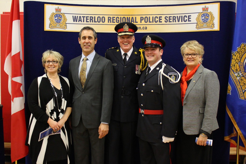 Former Floradale PS student with Chief of Police and members of the WRDSB.