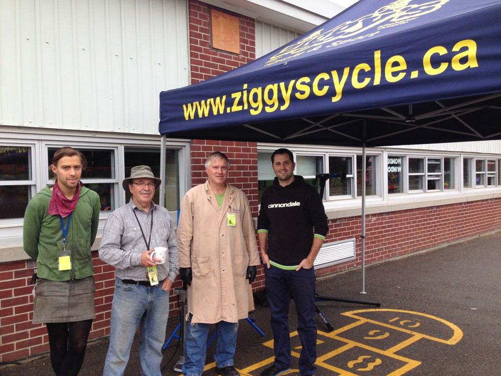 From left to right: Scott Calway (Bike Mechanic), Philip Martin (Program Coordinator), Bruce Hawkings (Bike Mechanic), & Zoltan Pop (Bike Mechanic).
