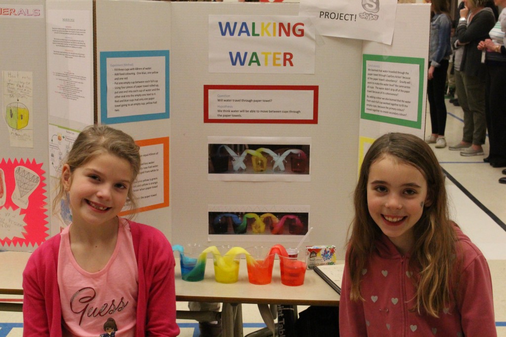 These science partners explain how water can 'walk' from one cup to the next!