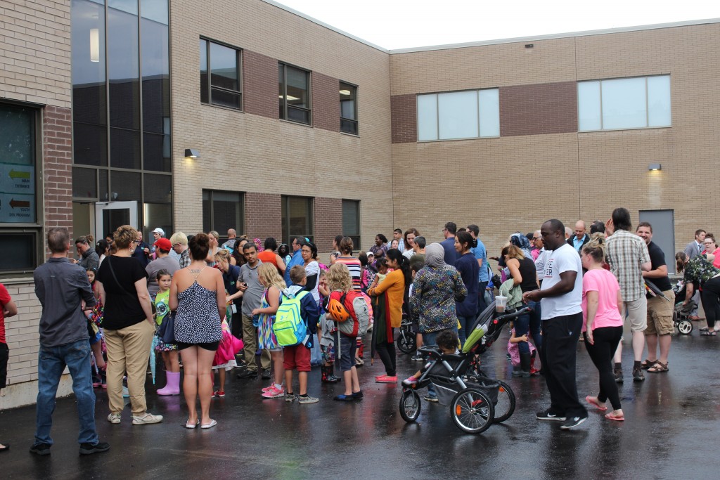 Parents dropping off their children to the new Westmount PS.