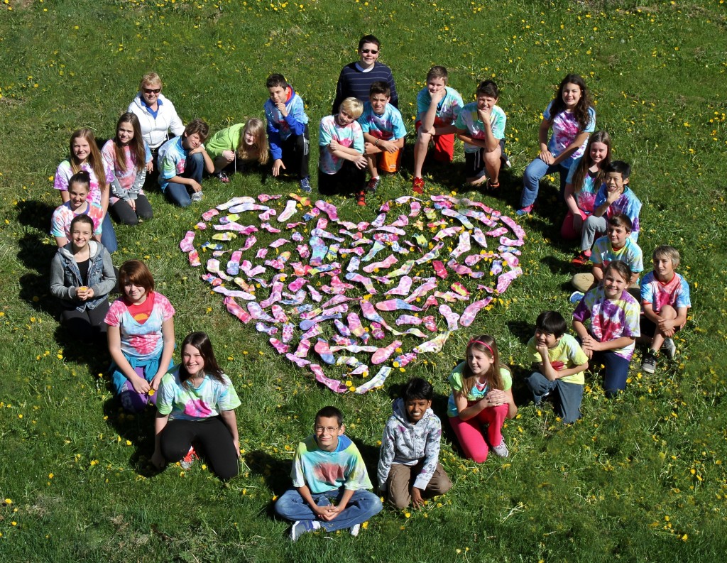 Mrs. Dunbar's class with tie dye sock heart.