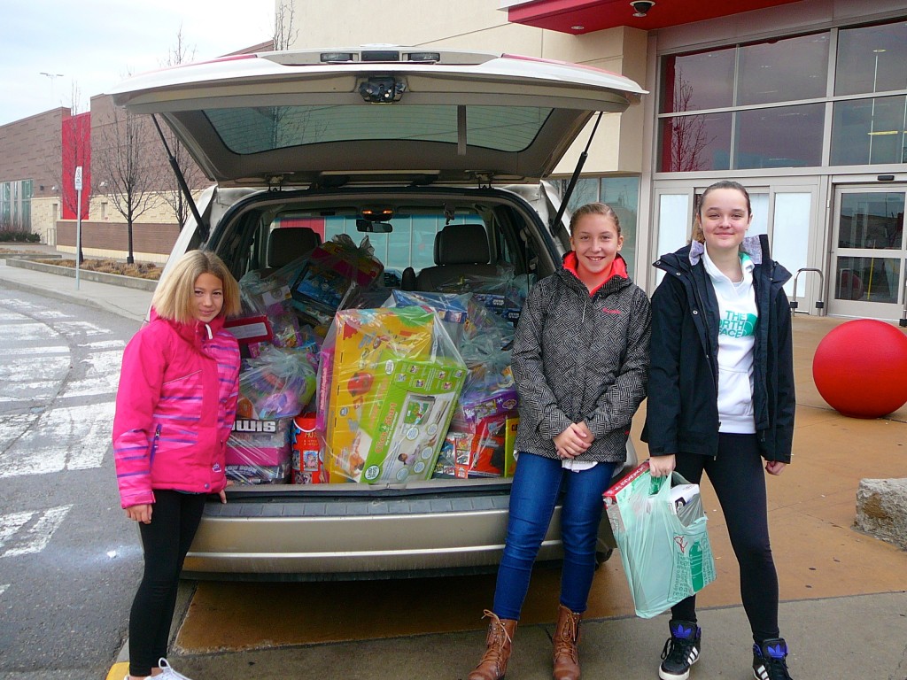 Lackner Woods PS students dropping off the gifts and money to the Tree of Angels campaign.
