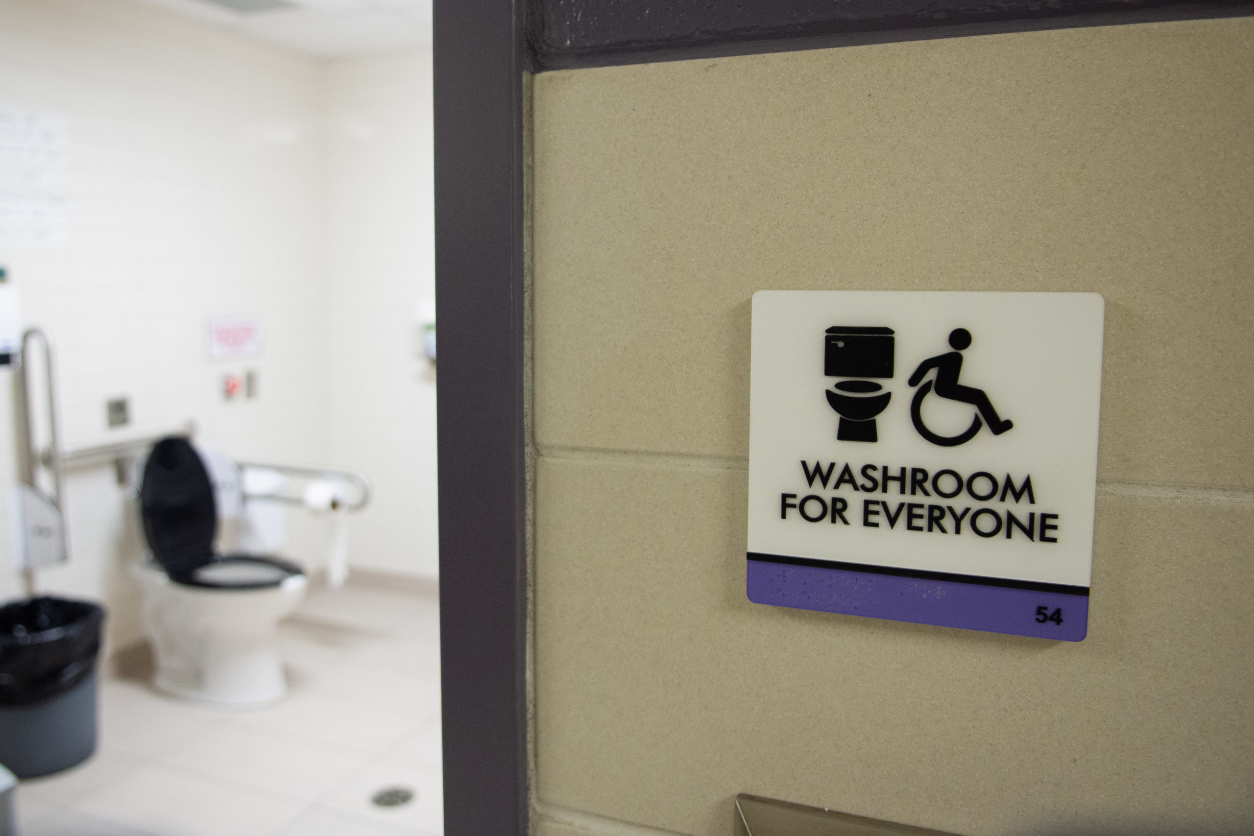 A sign outside a washroom reads "Washroom for Everyone"