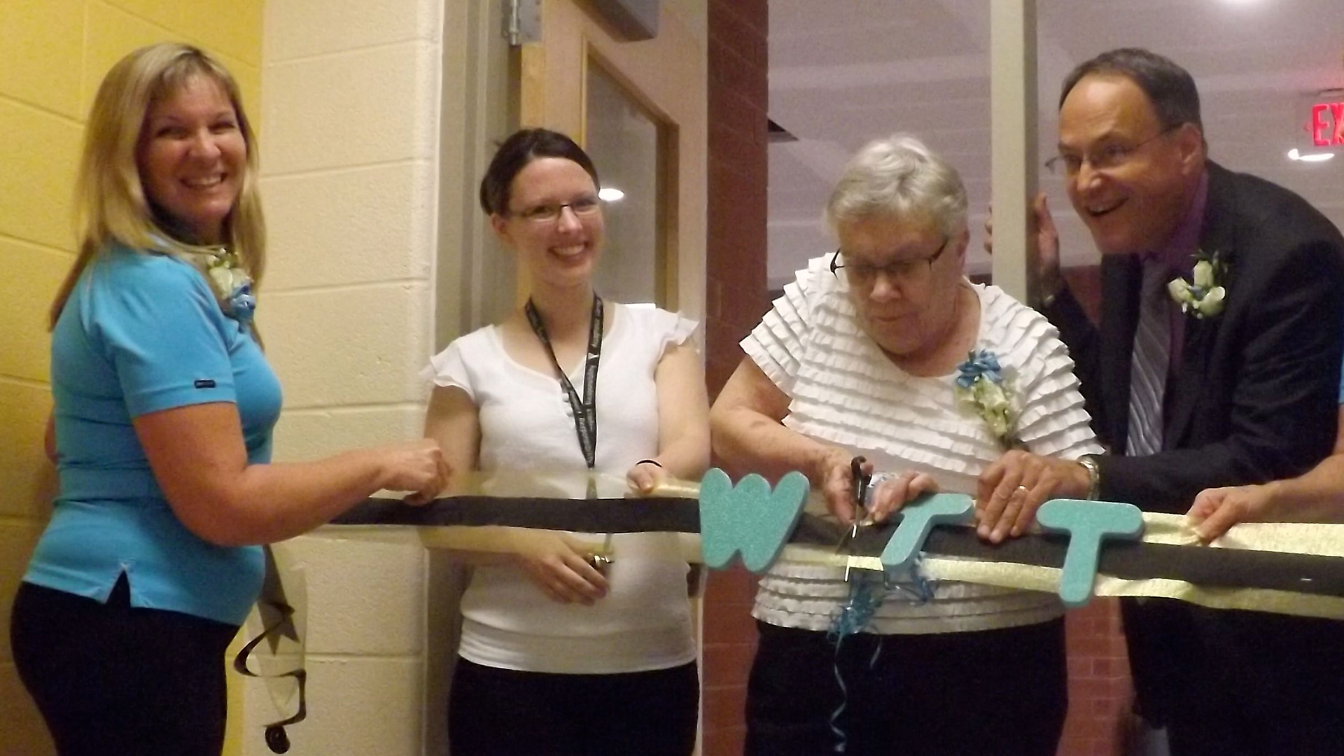Betty Townshend cuts the ribbon on the new wing at WT Townshend PS in 2013.