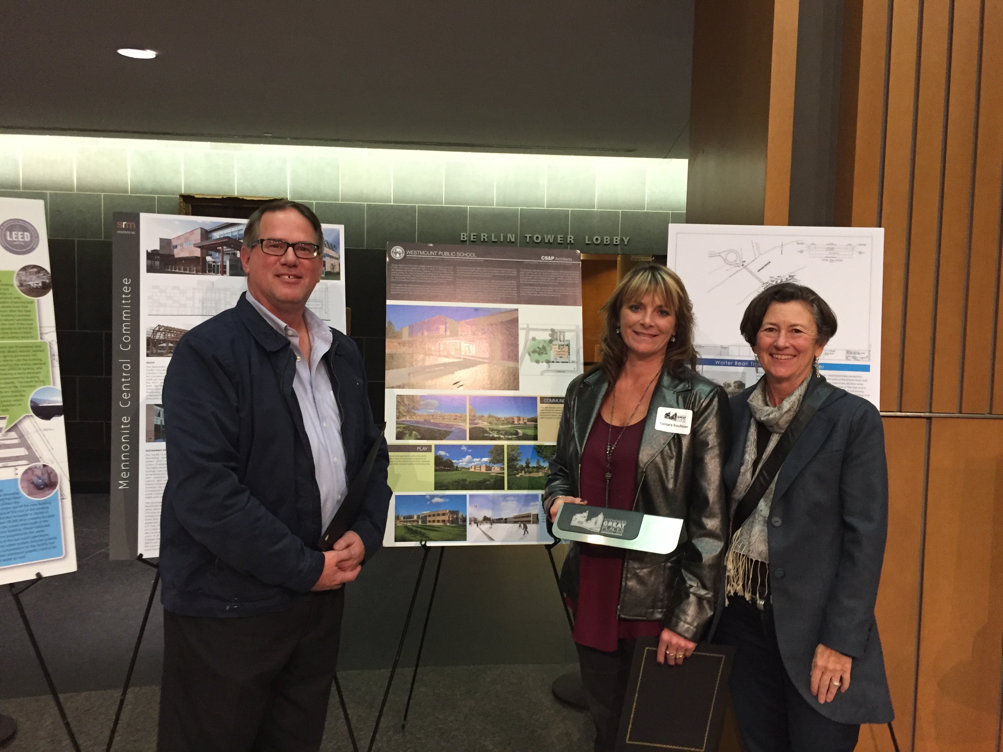 Project Coordinator Dale Wideman, Westmount Principal Tamara Kaufman and CS&P Architect Maureen O'Shaughnessy with their award.