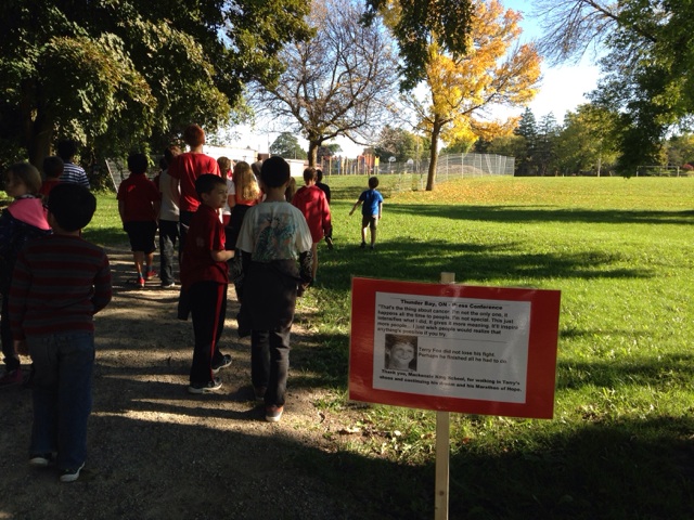 Students on their walk, learning about Terry's journey.