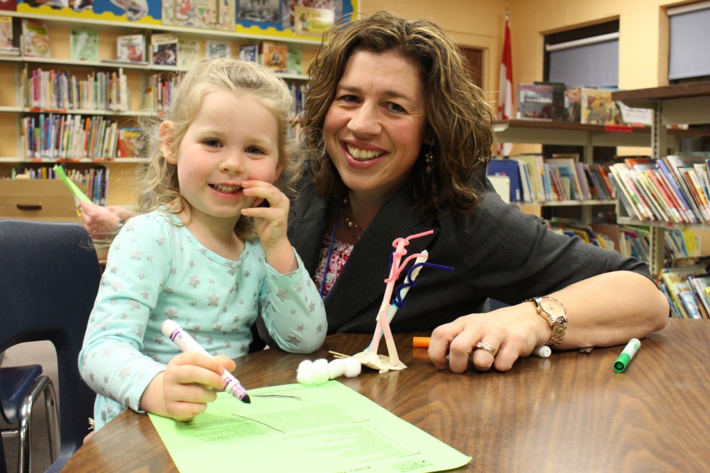 Mrs. Peebles and her daughter enjoying one of the activities.